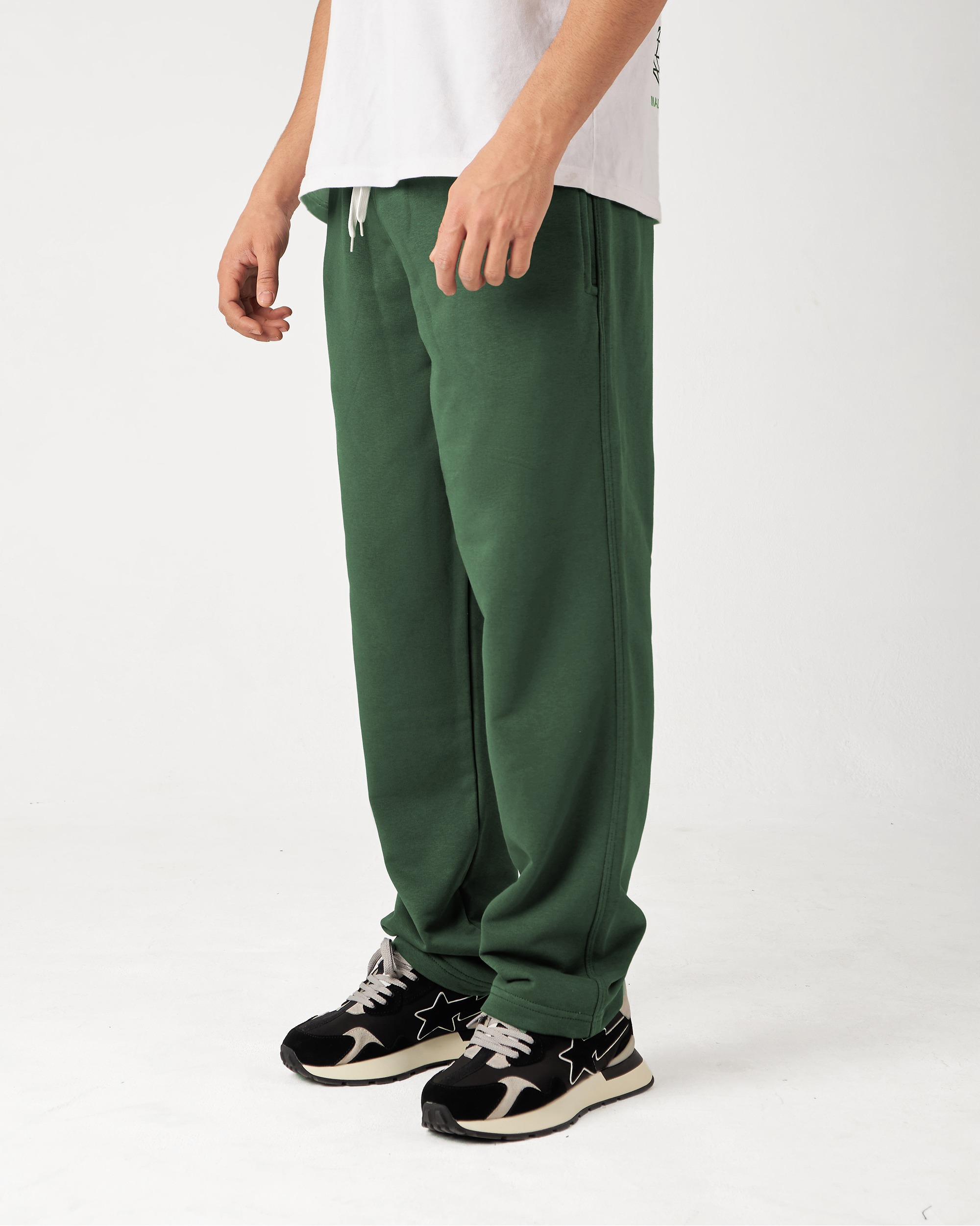 Introducing our Green Straight Fit Sweatpants, designed for comfort and easy movement. Made from Summer Melton 100% Cotton Fabric for a soft feel against the skin. Perfect for everyday wear, Add them to your wardrobe today and experience the ultimate blend of comfort and style.