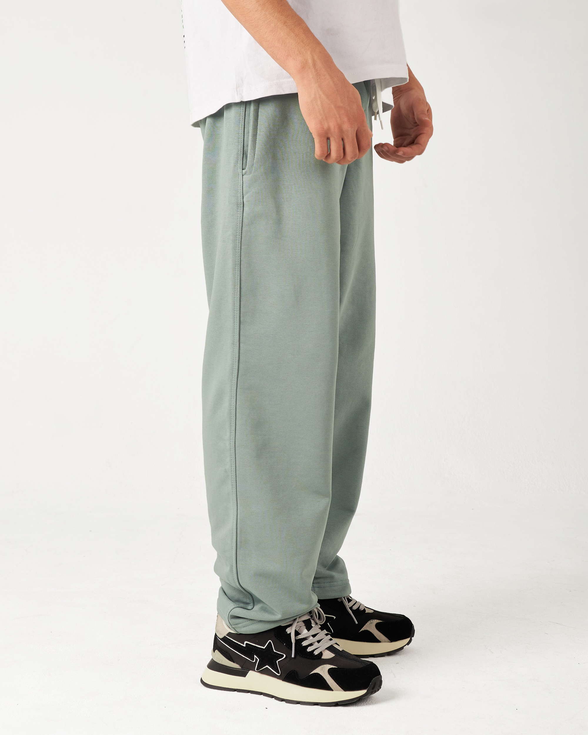 Introducing our Mint Green Straight Fit Sweatpants, designed for comfort and easy movement. Made from Summer Melton 100% Cotton Fabric for a soft feel against the skin. Perfect for everyday wear, Add them to your wardrobe today and experience the ultimate blend of comfort and style.