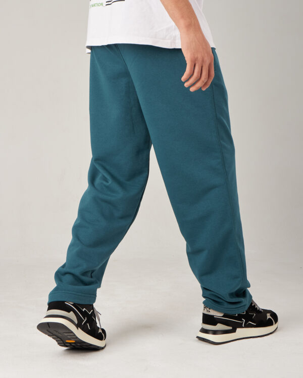 Introducing our Teal Color of Straight Fit Sweatpants, designed for comfort and easy movement. Made from Summer Melton 100% Cotton Fabric for a soft feel against the skin. Perfect for everyday wear, Add them to your wardrobe today and experience the ultimate blend of comfort and style.