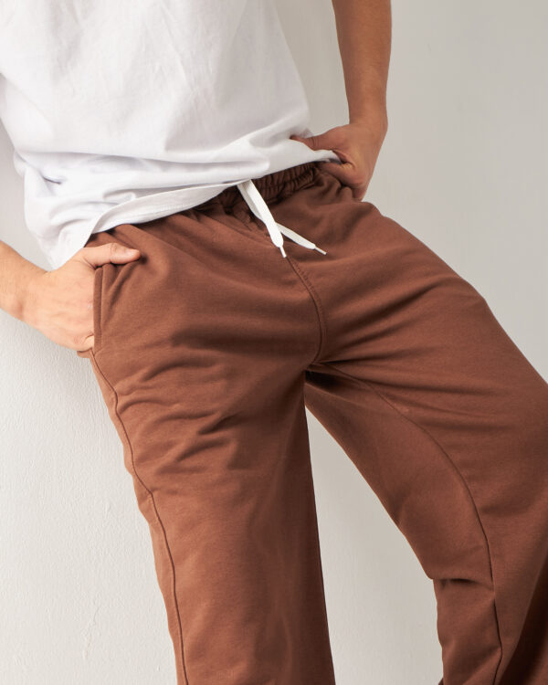 Introducing our Brown Straight Fit Sweatpants, designed for comfort and easy movement. Made from Summer Melton 100% Cotton Fabric for a soft feel against the skin. Perfect for everyday wear, Add them to your wardrobe today and experience the ultimate blend of comfort and style.