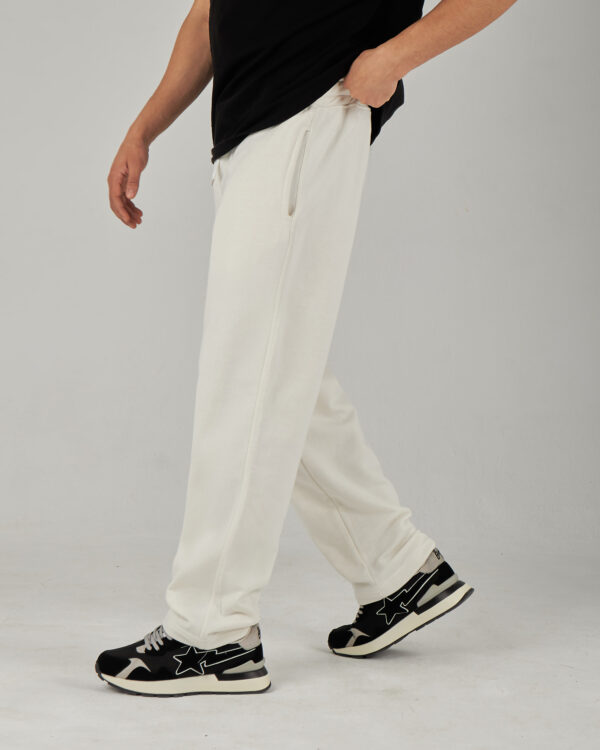 Introducing our White Straight Fit Sweatpants, designed for comfort and easy movement. Made from Summer Melton 100% Cotton Fabric for a soft feel against the skin. Perfect for everyday wear, Add them to your wardrobe today and experience the ultimate blend of comfort and style.